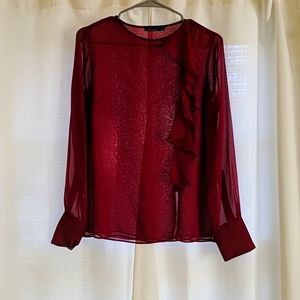 The limited burgundy blouse